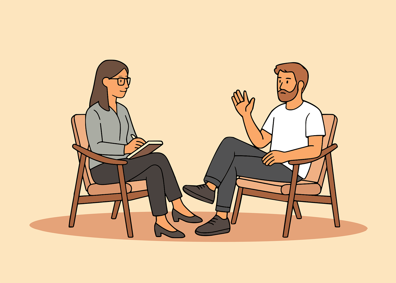 심리상담사가 상담 내용을 들으며 노트에 내용을 적고 있는 모습입니다.