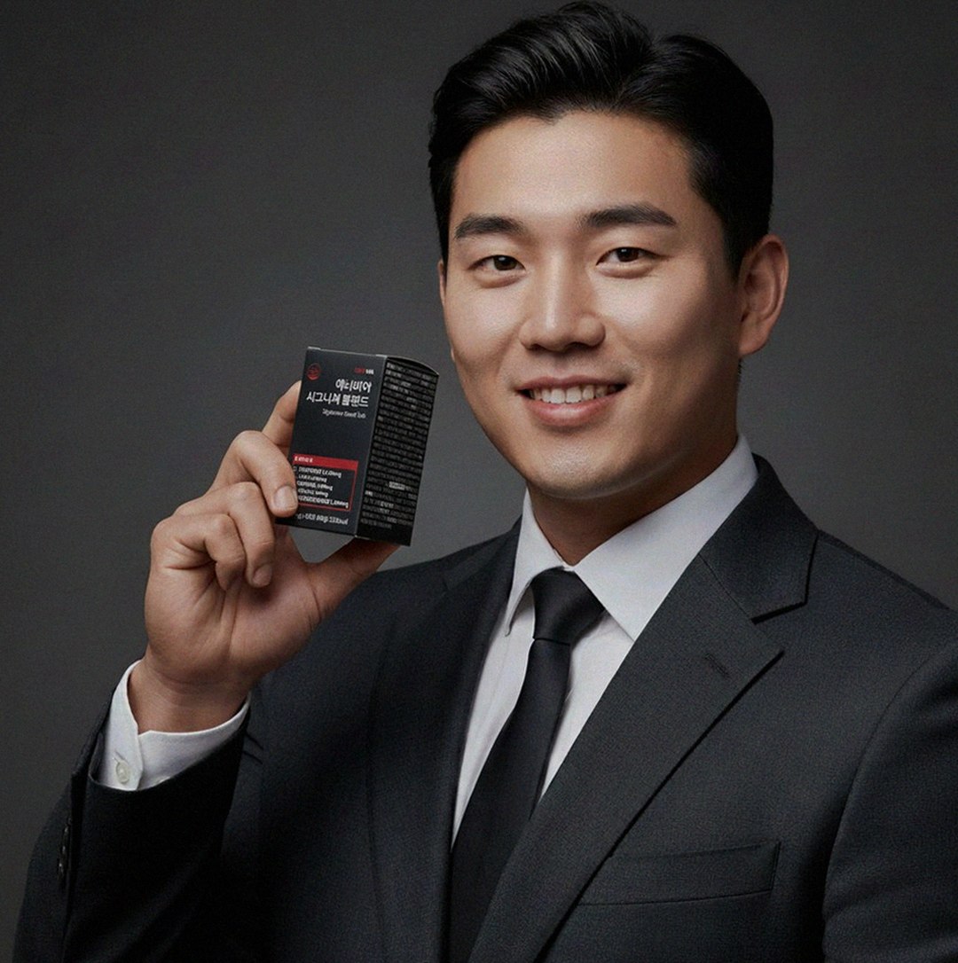 Korean Asian man 42 years old searching supplement information on smartphone at office desk afternoon