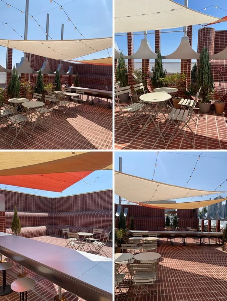 천막과 단체가 앉을 수 있는 긴 테이블