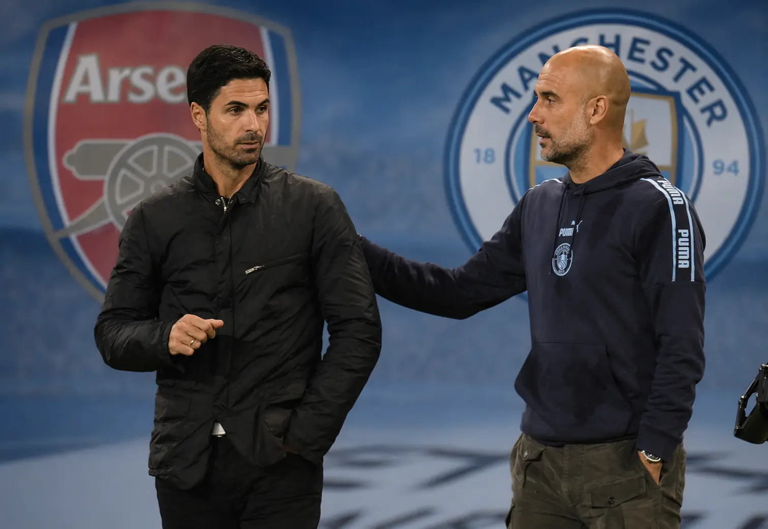 프리미어리그 우승 경쟁을 벌이는 맨시티와 아스널 감독의 모습