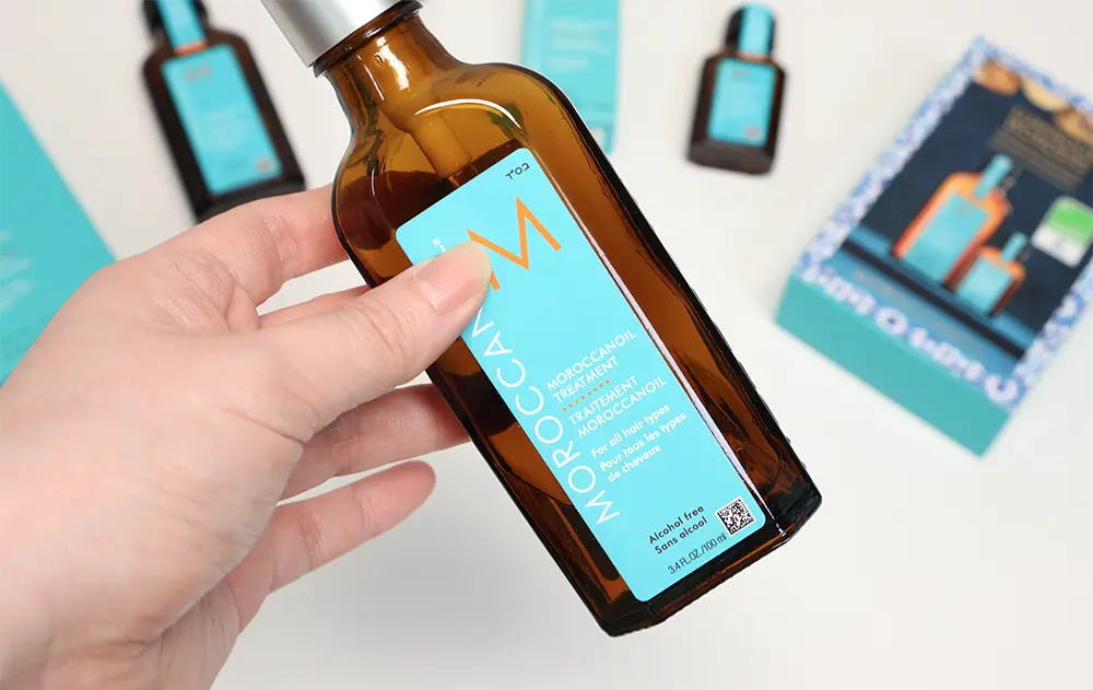 사용중인-모로칸오일-적게-남은양을-병을-들어-보여줌