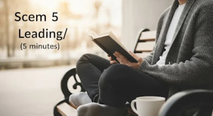 점심시간에 따뜻한 커피 한 잔을 옆에 두고 공원 벤치에 앉아 편안한 자세로 책을 읽고 있는 남성