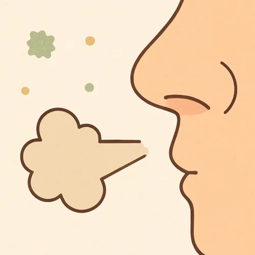 재채기를 하는 남성의 코