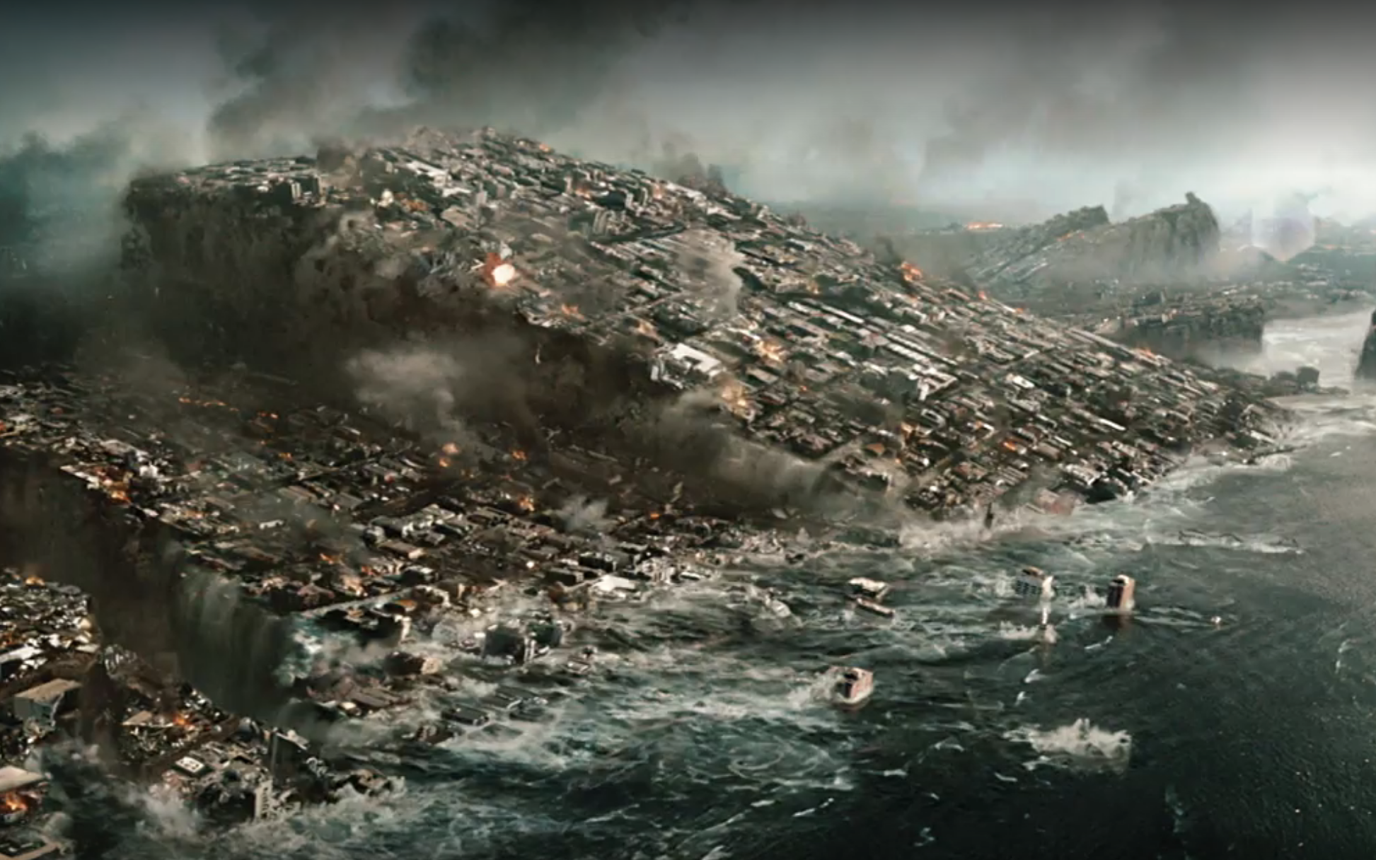 도시가 무너져 바다로 빠지는 모습.