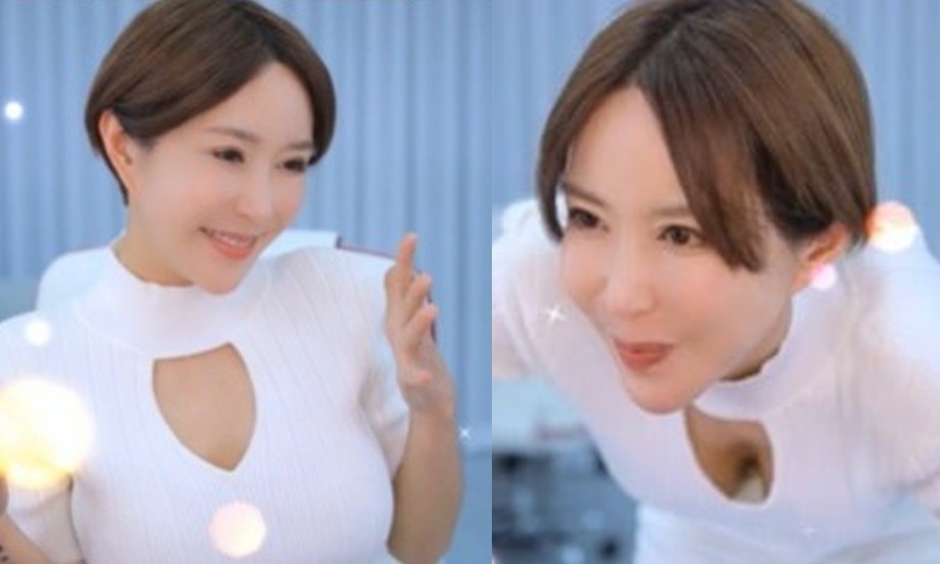 가슴골 보이는 의상을 입고 인사하는 BJ 슈