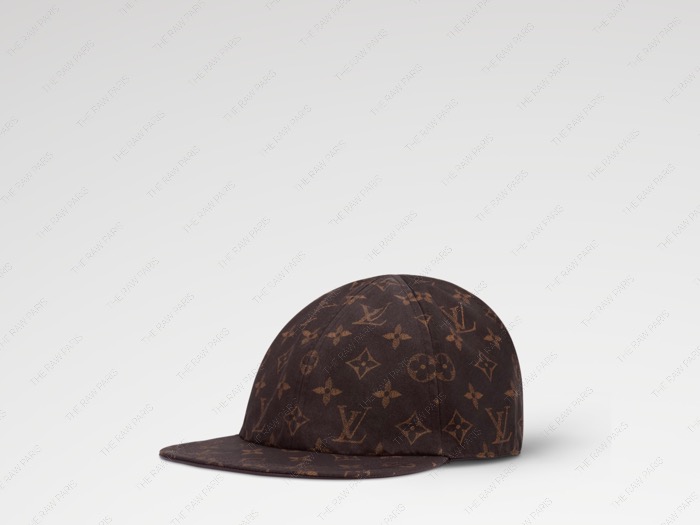 Three-quarter view of Louis Vuitton monogram baseball cap in dark brown Silk Tech fabric