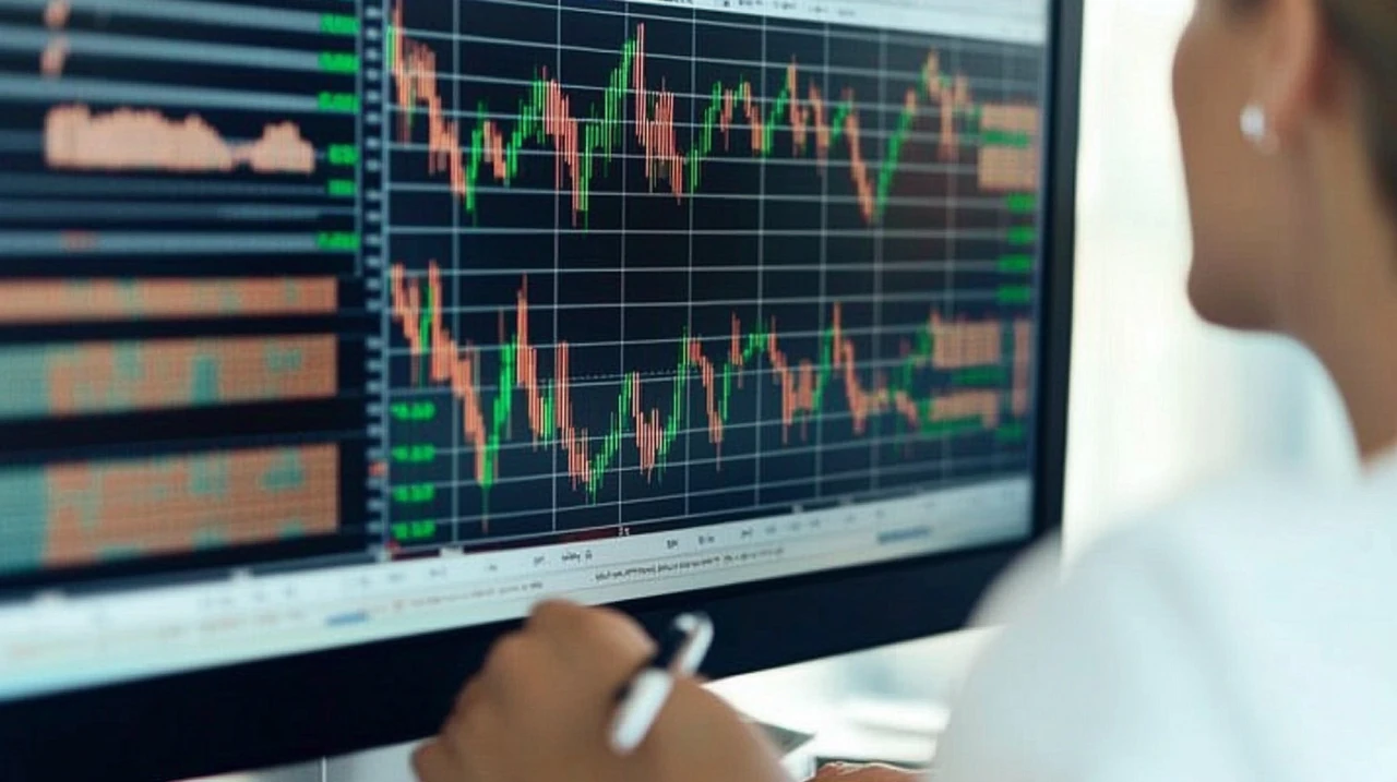 투자자가 컴퓨터 모니터에서 국내외 시장의 ETF 그래프를 분석하는 장면으로, 집중력 있는 환경을 조성하며 투자 전략을 계획하는 순간을 포착합니다.