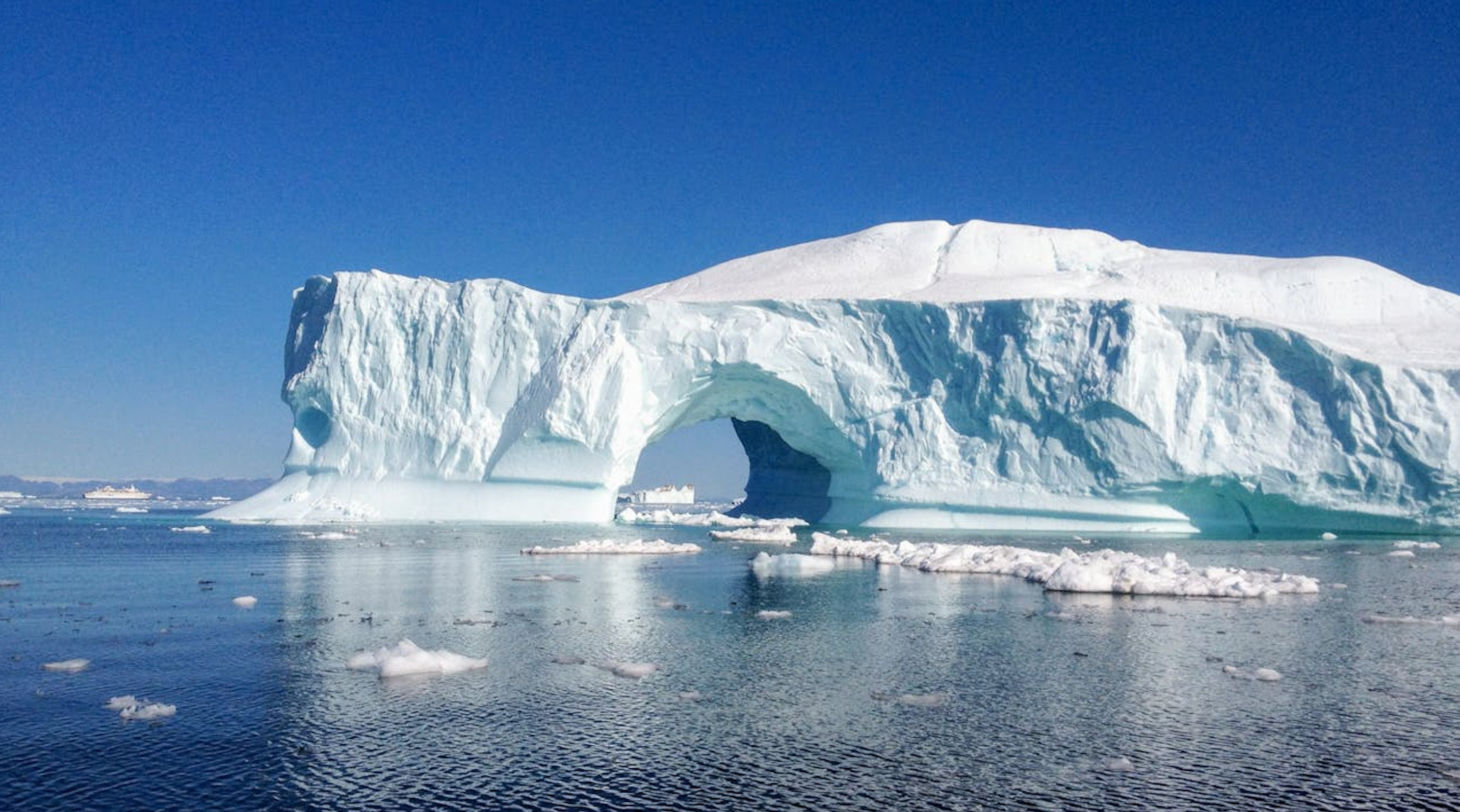 A Majestic Ice Arch in the Antarctic Wilderness