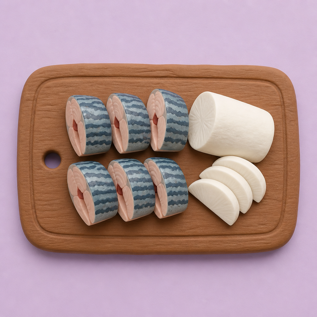 도마 위에 가지런히 놓인 고등어 토막과 무
