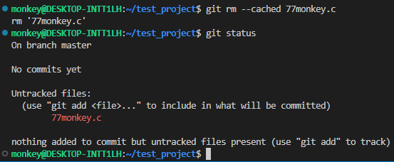 git rm --cached 77monkey.c; git status