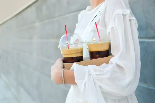 Koreans drinking iced americano coffee in winter