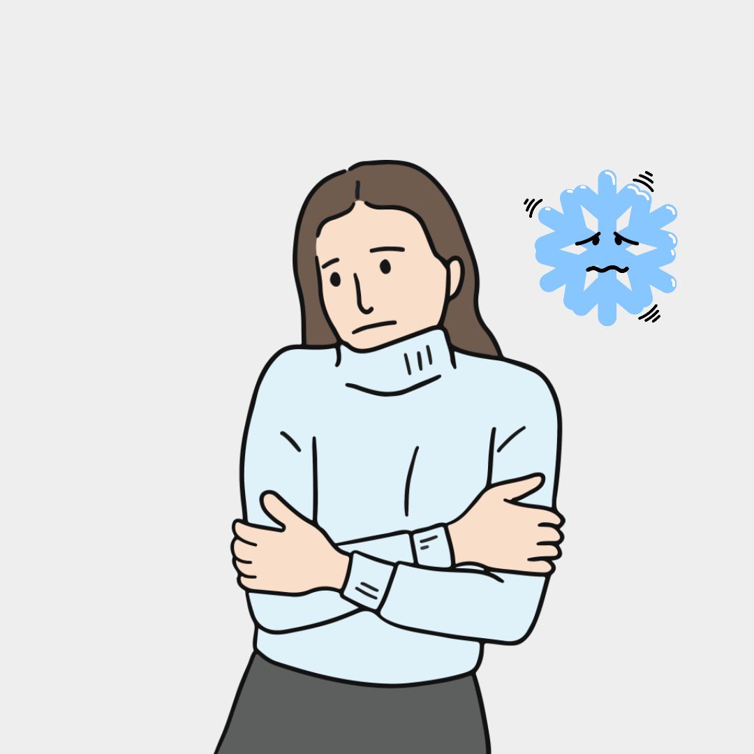 추위에 떨고 있는 여자