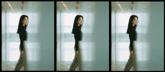 밝은 복도에서 걷는 인물을 부드럽게 따라가며 초점을 유지하는 트래킹 포커스 영상_Midjourney