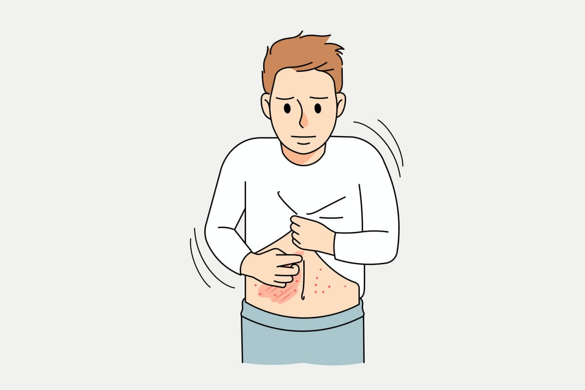 콜린성알레르기로-배를-긁고-있는-남성