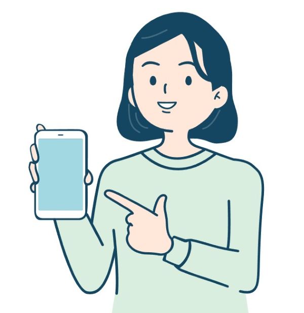 중고햔드폰을 들고 망설이는 장면