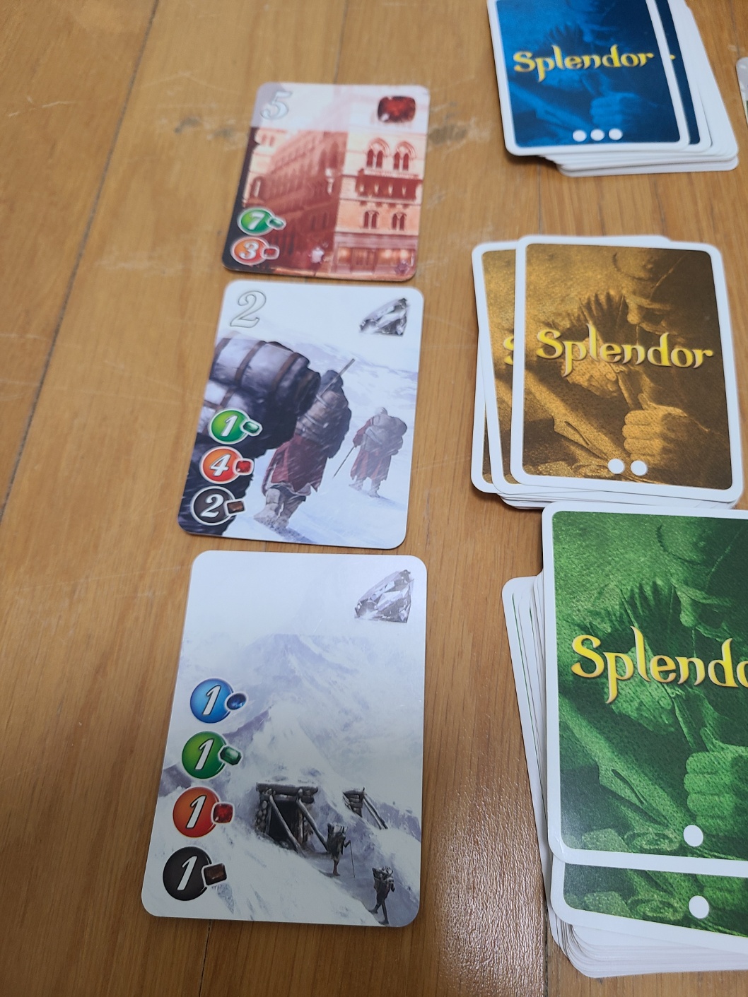 스플렌더 보드게임의 1단계, 2단계, 3단계 개발 카드 이미지