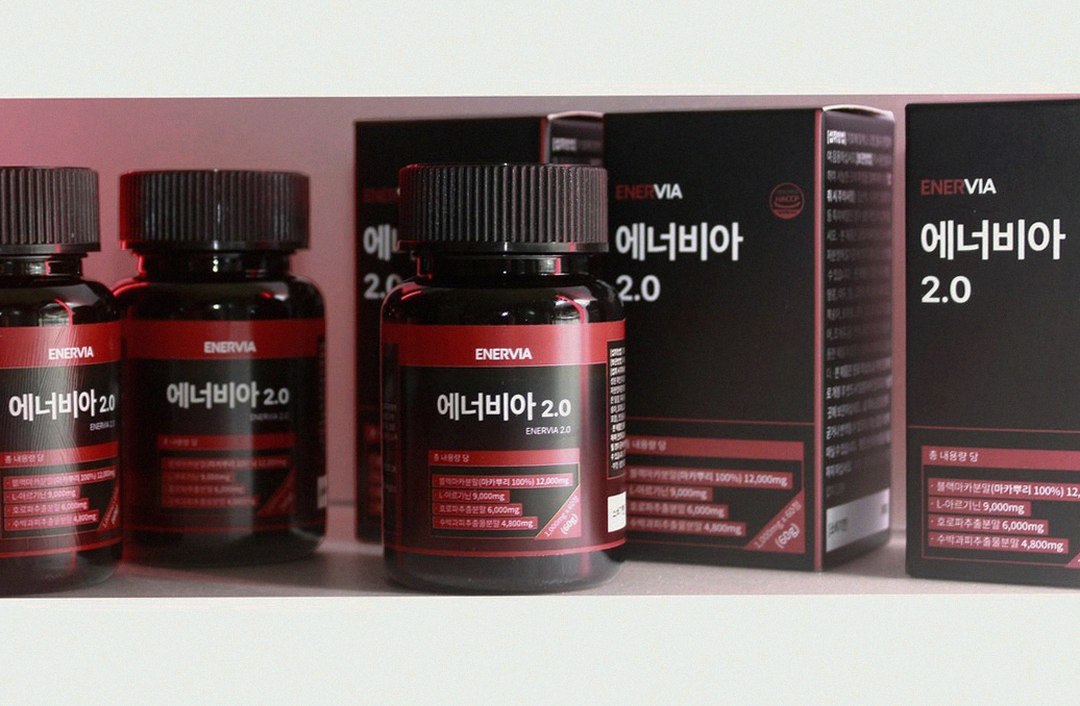 Korean Asian middle-aged man taking supplements in evening at home