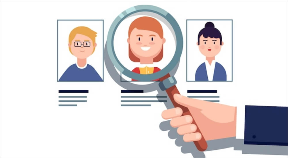 증명사진위에 돋보기를 갖다대는 이미지