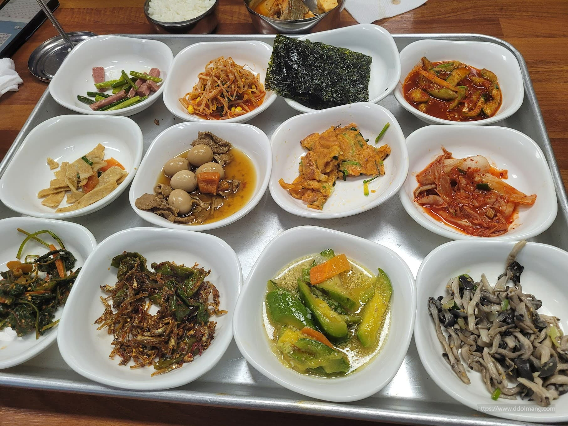 Banchan: Various side dishes such as kimchi, seasoned vegetables, and salads are served for free.