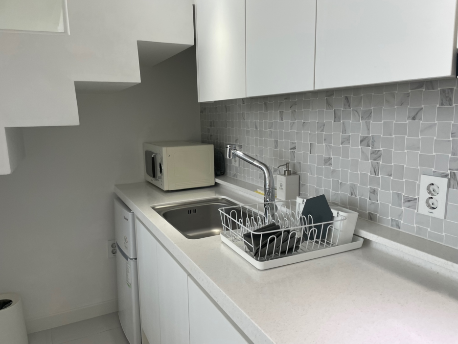 더헤이븐리조트 디럭스오션룸 전자레인지 냉장고 사진