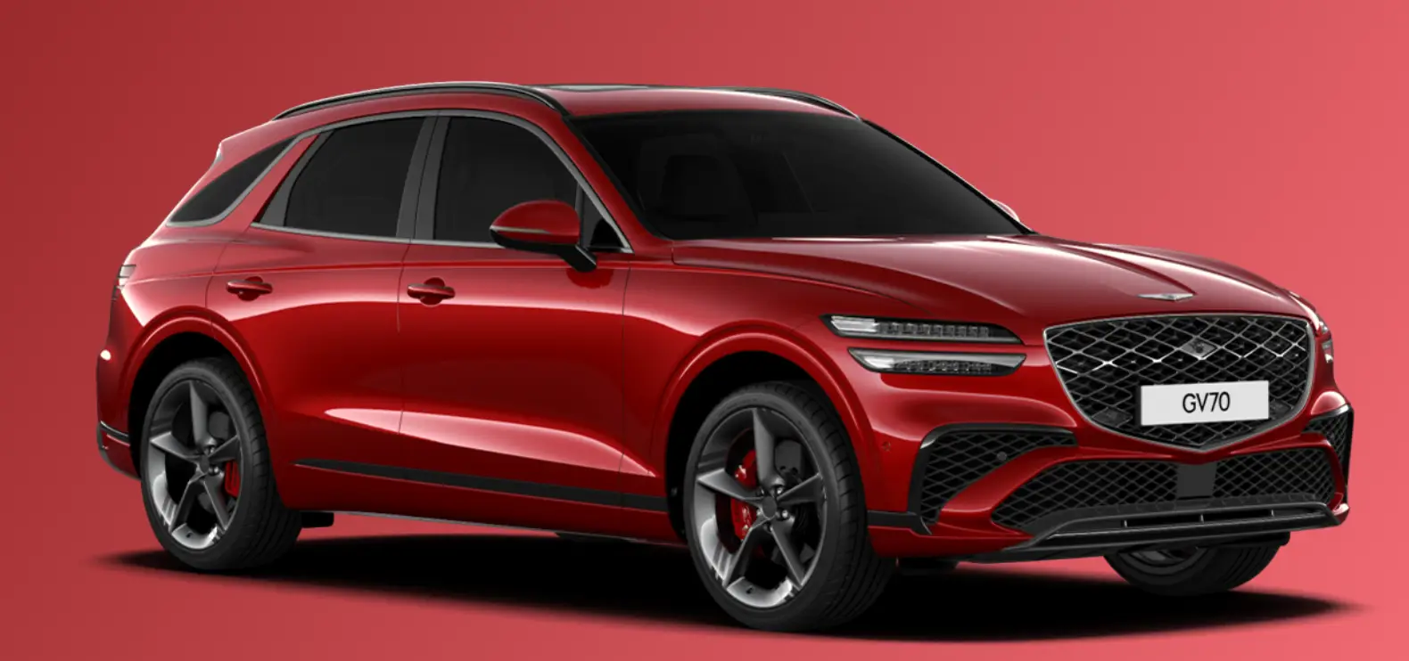 붉은 배경 측면으로 비스듬히 서있는 붉은색 차량 이미지