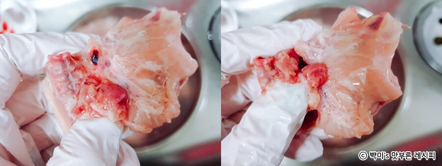 닭볶음용 닭의 내장을 제거하는 과정으로 깔끔하게 손질하는 모습