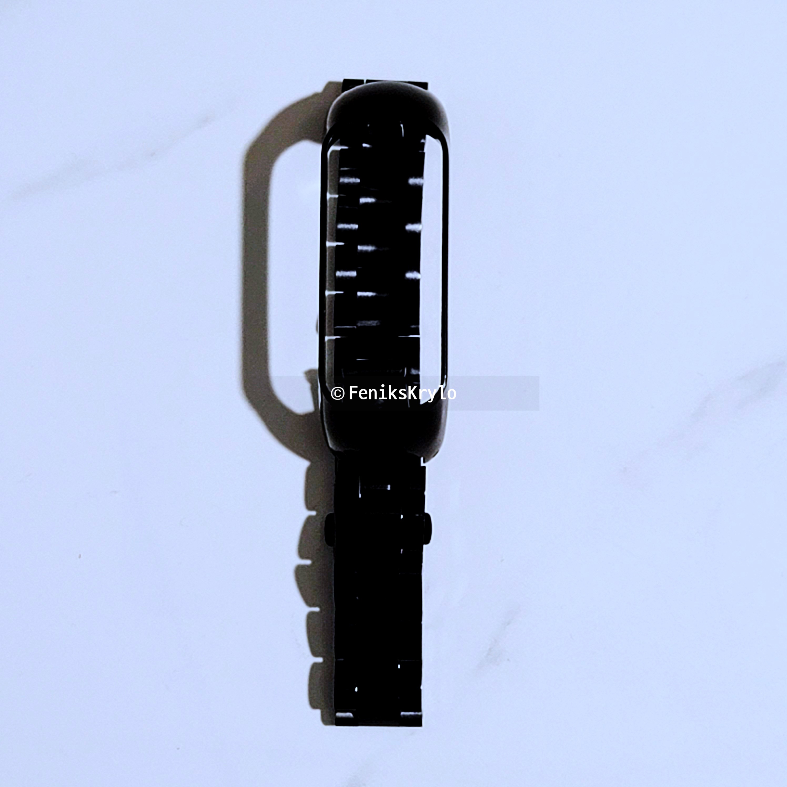 포장을-뜯은-갤럭시-핏2-블랙-메탈-체인-모습이다.