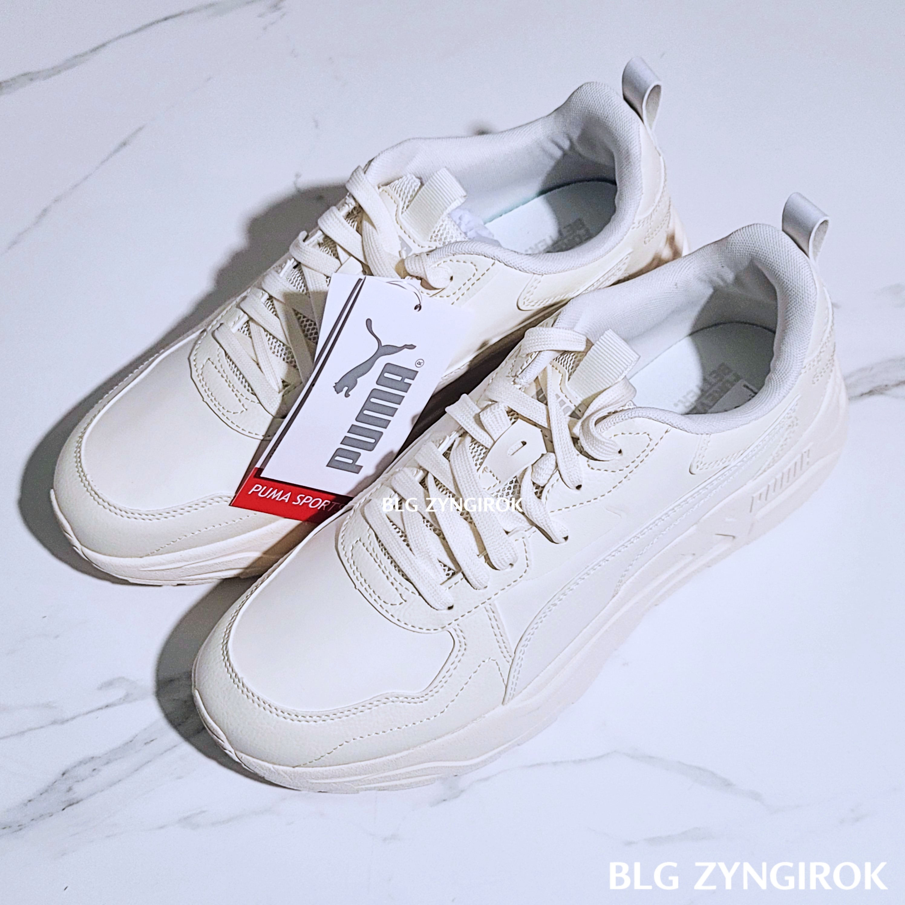 퓨마-트리니티-라이트-SL이-테이블에-놓여있다.