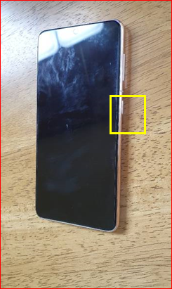 측면 버튼을 길게 누르기