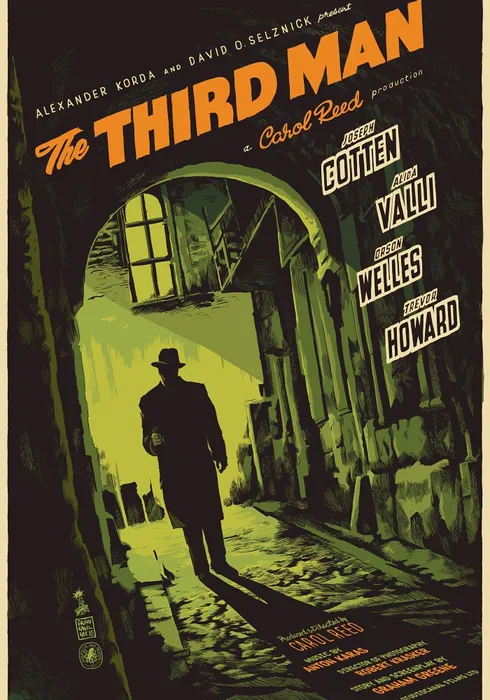 어두운 빈의 골목길, 가로등 불빛 아래 거대한 그림자가 드리워진 남자의 실루엣.