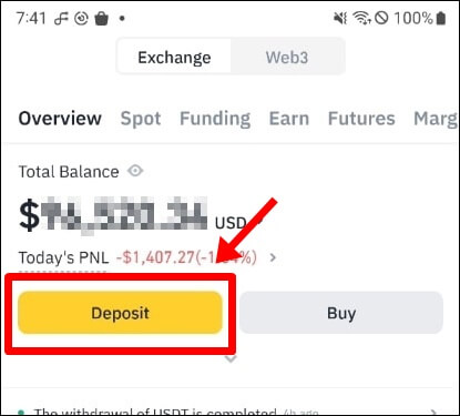 바이낸스 노란색 입금 버튼을 가리키는 사진