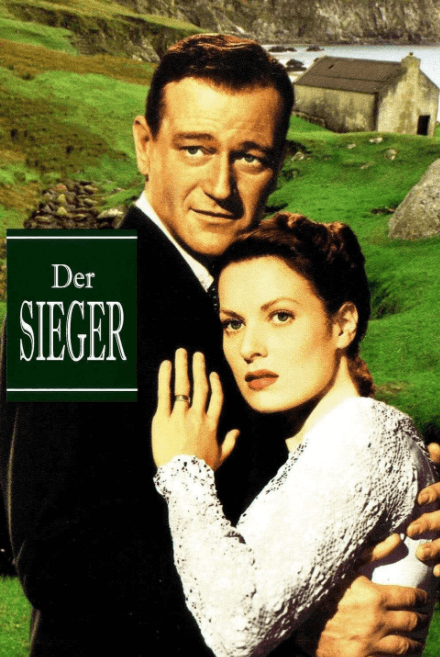 존포드 감독의 작품중 하나, 남자와 여자가 사진에 나와있고 여자는 남자의 품에 안겨있다 하얀색 옷을 입고 남자는 검은색 정장을 입고있다 뒤의 배경으로는 산과 비포장 지역의 모습이 보인다.