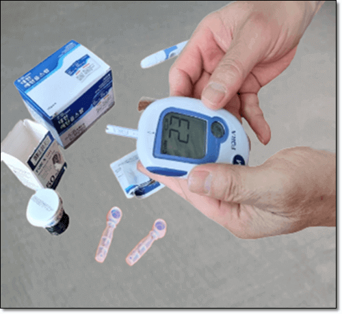 혈당체크 하는 당뇨병 환자