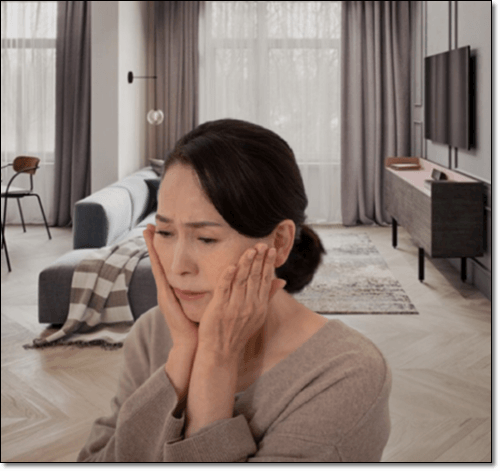 월경전 증후군을 겪는 여성