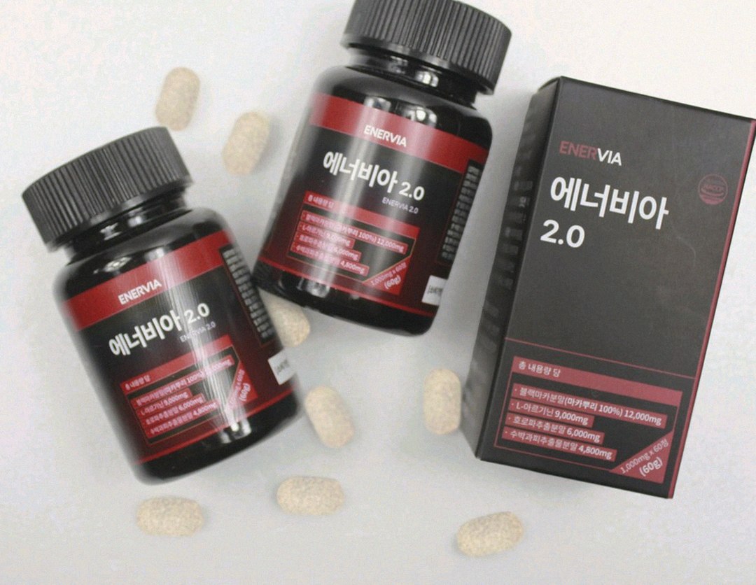 Korean Asian man in his 30s preparing supplements before gym workout in morning light