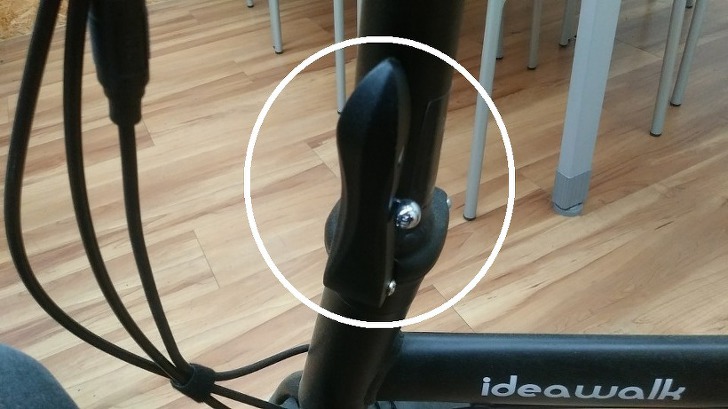 Detailed view of the folding lock lever on the Ideawalk folding electric bike