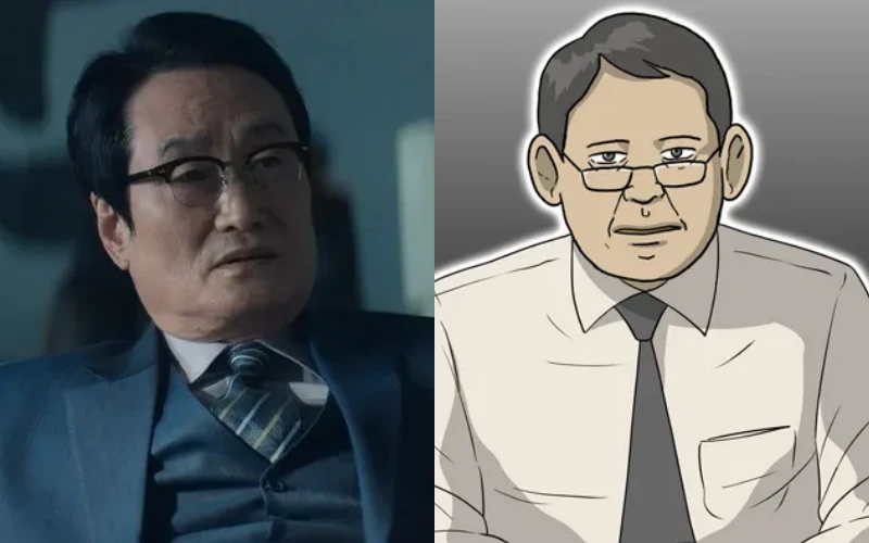 짙은 파랑 정장을 입고 안경을 쓴 드라마 무빙의 민용준