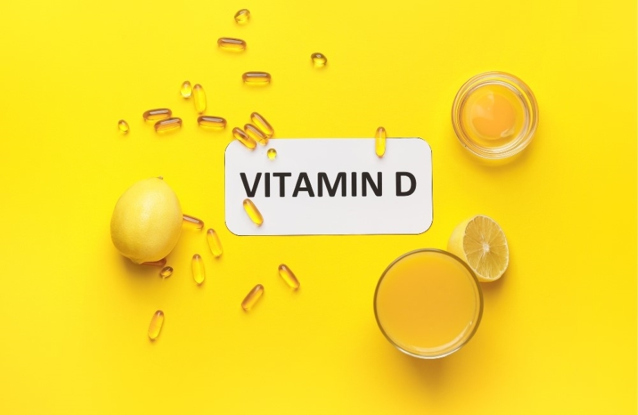 노랑색 바탕 배경 위에 비타민 D 글씨와 레몬이 함께 놓여진 이미지 via canva