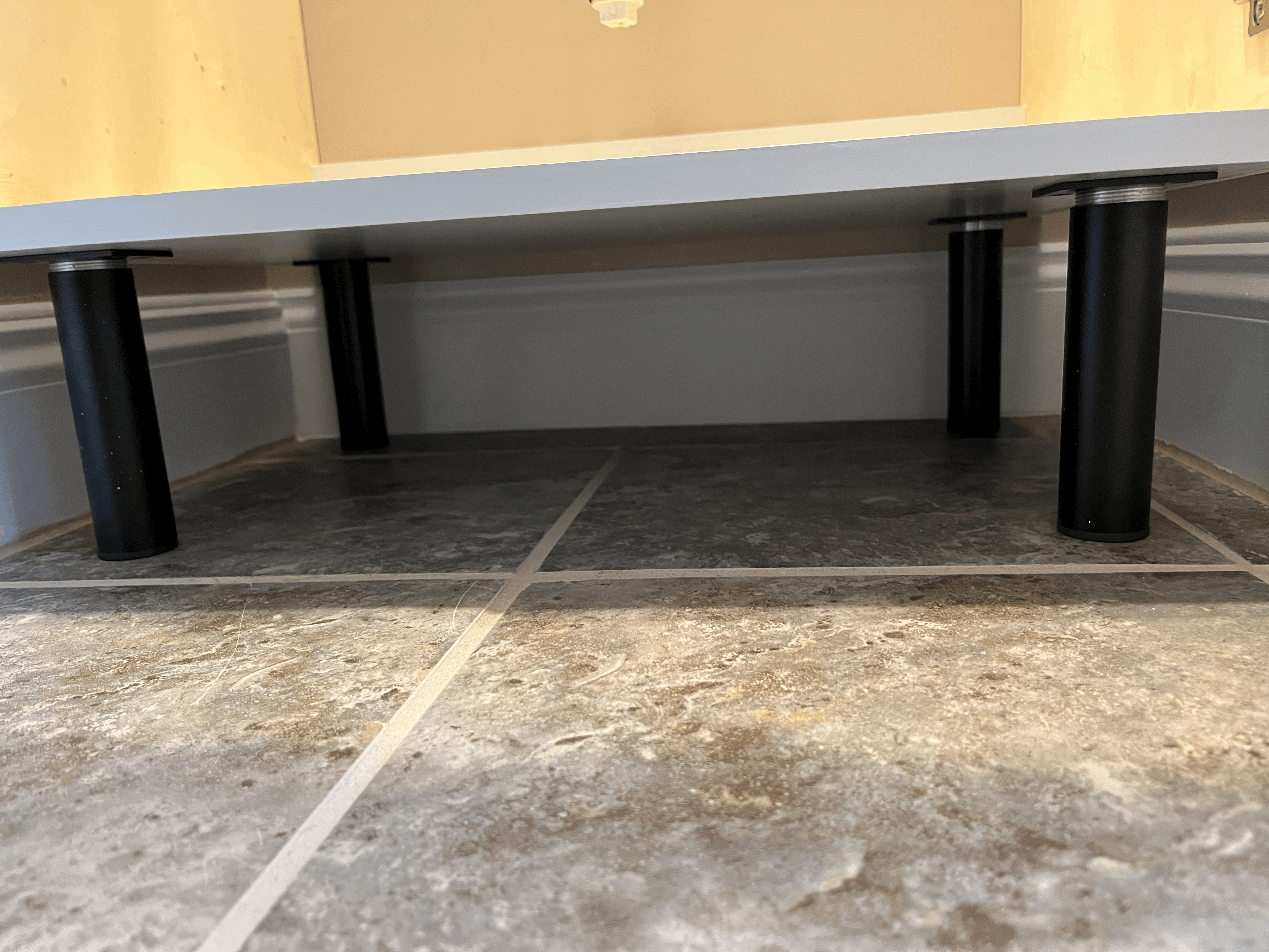adjustable legs for cabinet