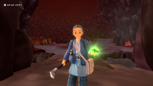 개 얄미운 얼굴의 베넷이 녹색 트래블 라이트를 들고 온다.