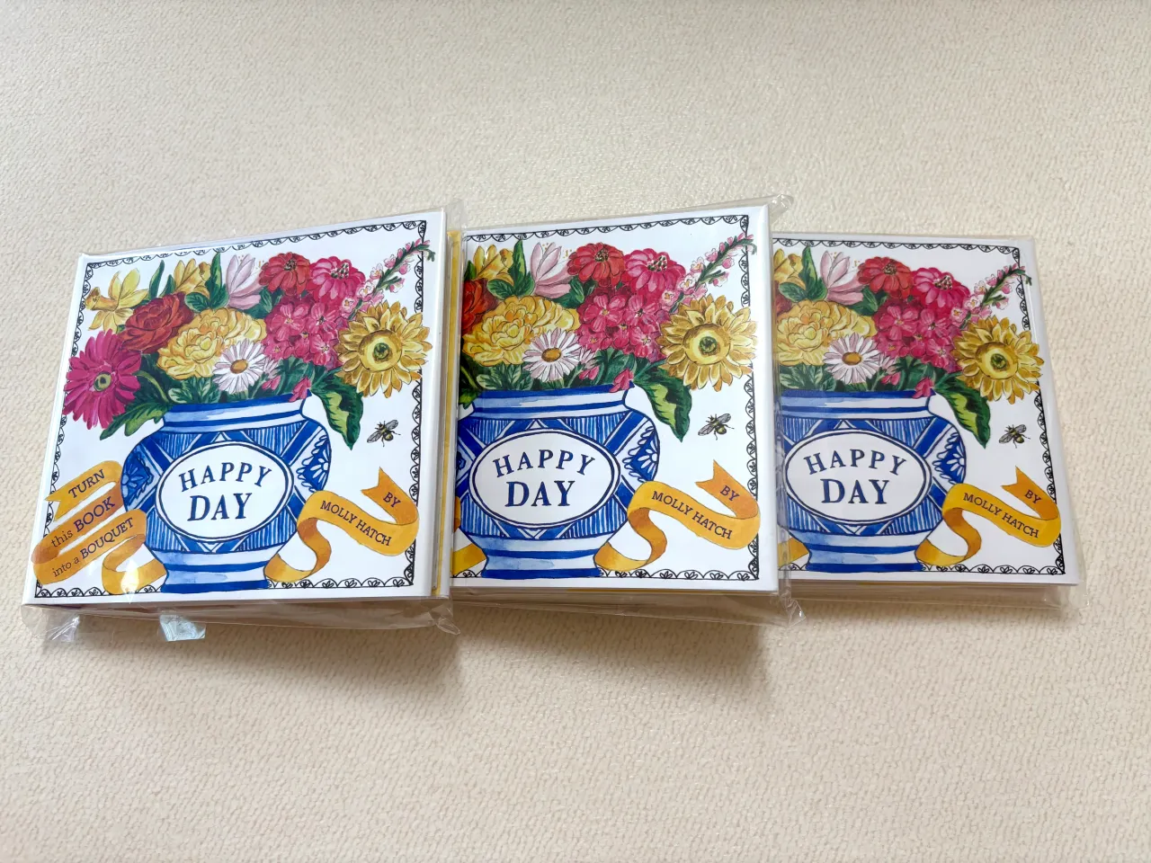 바닥에-놓인-부케북-3권