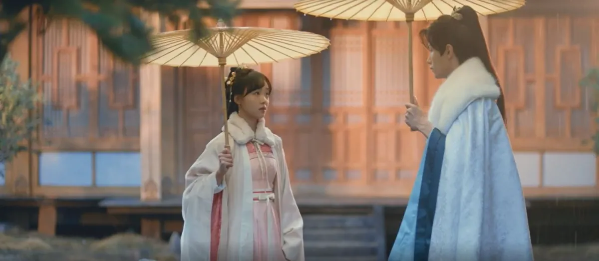 우산을-쓰고-서로바라보고있는-당천월-능장풍