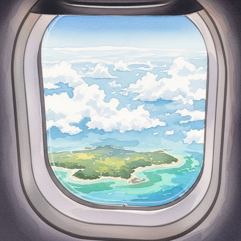 비행기 창가 너머로 보이는 푸른 바다와 섬의 모습