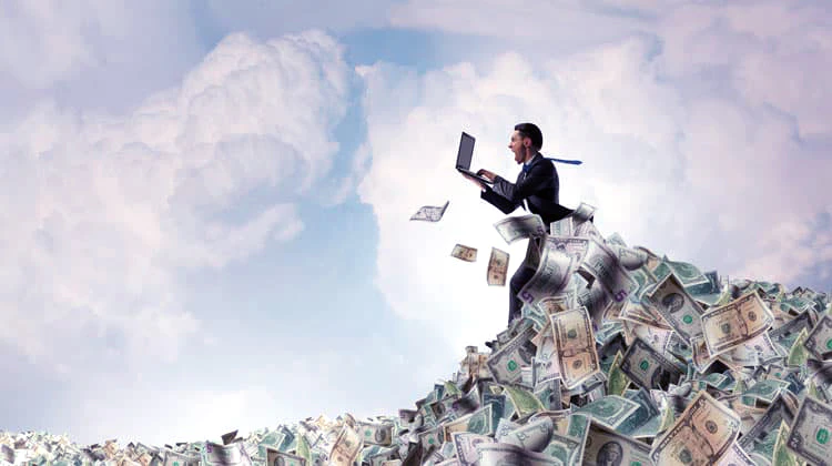 노트북을 든 남성이 하늘을 나는 모습