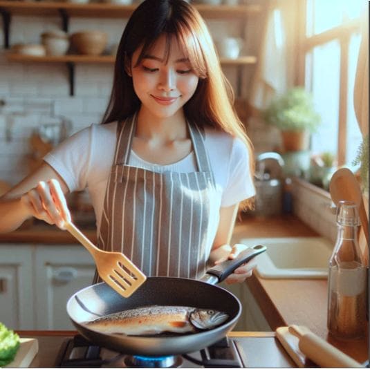 송어 구이 하는 여성