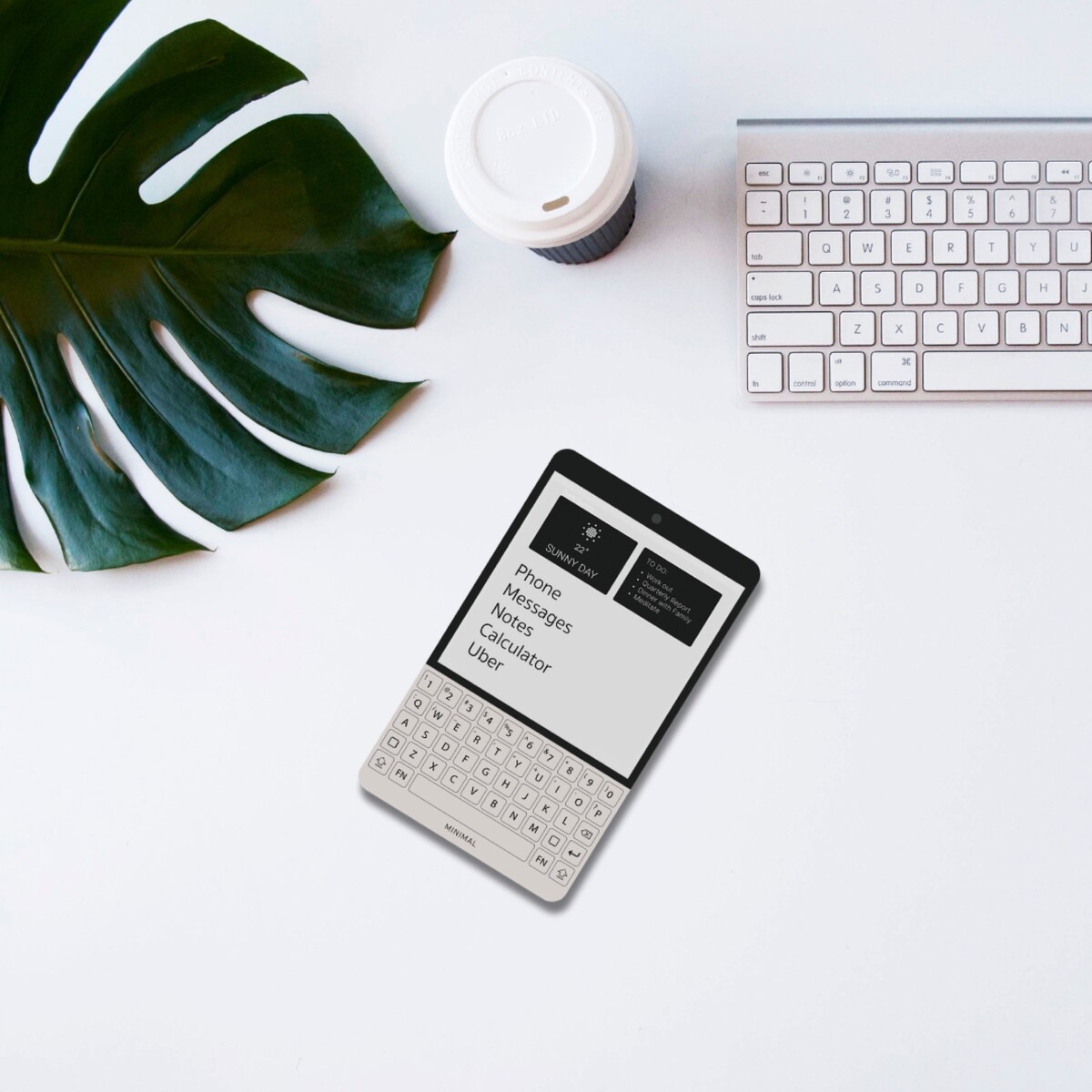 Minimal Phone 전면 디자인과 물리 QWERTY 키보드 클로즈업