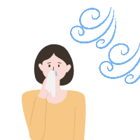 추워서 콧물을 닦는 여성