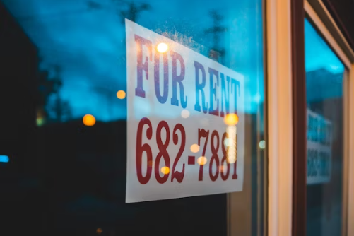 FOR RENT 라고 써있는 안내판