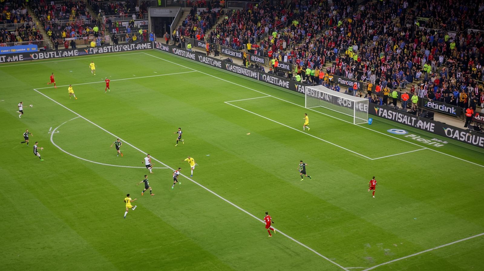 They are playing a soccer.