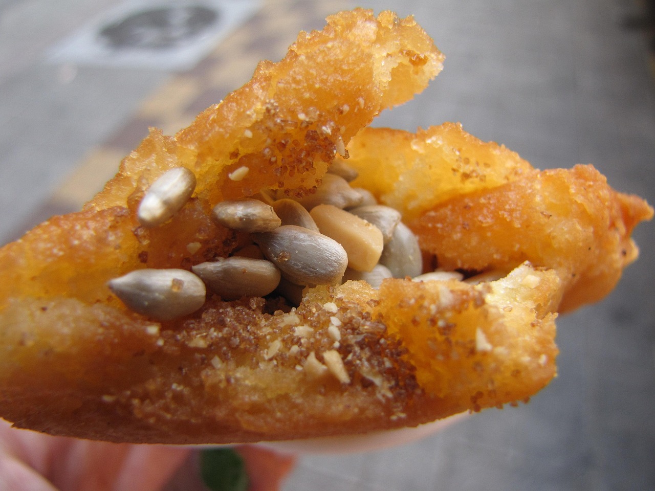 Hotteok filled with brown sugar, cinnamon, and sunflower seeds